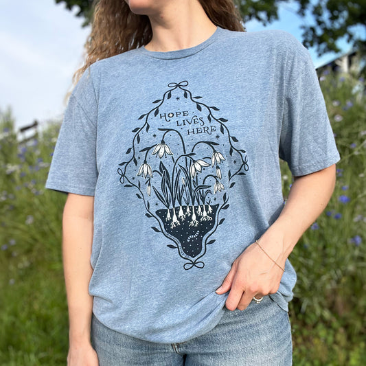 Hope Lives Here | Snow Drops | January Birth Flower | Heather Blue Tee | XL