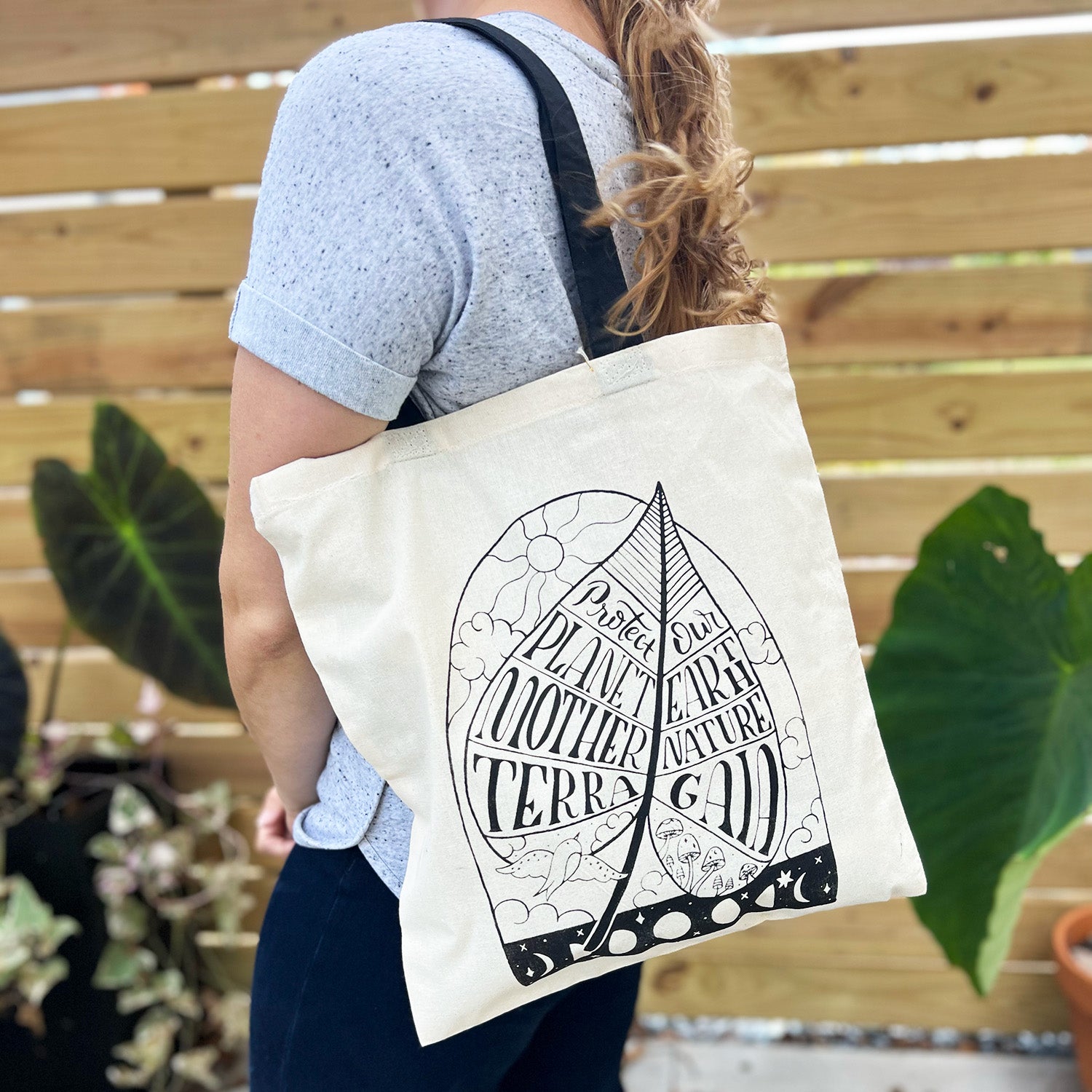 Protect Mother Nature | Cream Tote Bag with Black Accent Handle.