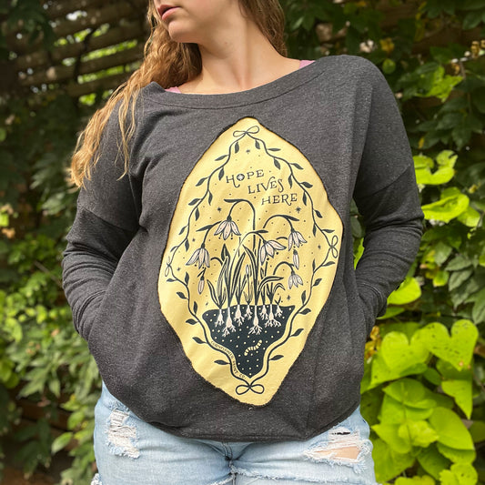 Hope Lives Here | Snow Drops | January Birth Flower | Dark Gray Sweater with Pockets | Medium