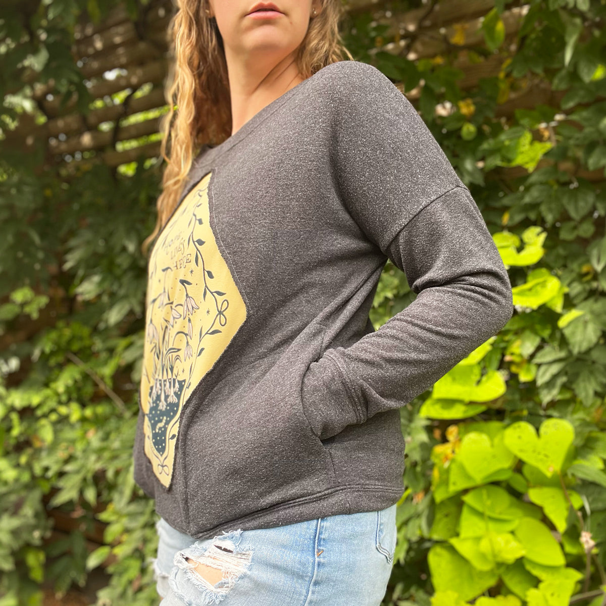 Hope Lives Here | Snow Drops | January Birth Flower | Dark Gray Sweater with Pockets | Medium