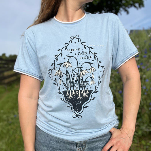 Hope Lives Here | Snow Drops | January Birth Flower | Light Blue Tee | Large