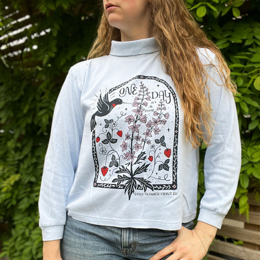 One Day at a Time | July Birth Flower | Light Blue Long Sleeve Shirt | Large