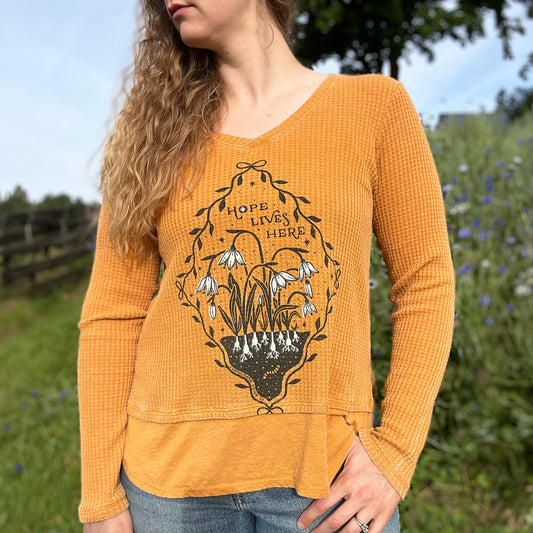 Hope Lives Here | Snow Drops | January Birth Flower | Mustard Yellow Waffle Knit Long Sleeve | Medium