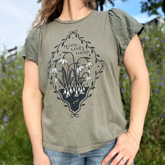 Hope Lives Here | Snow Drops | January Birth Flower | Olive Green Tee | XL
