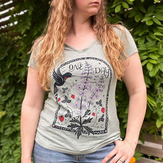 One Day at a Time | July Birth Flower | Muted Green V-Neck Tee | Small
