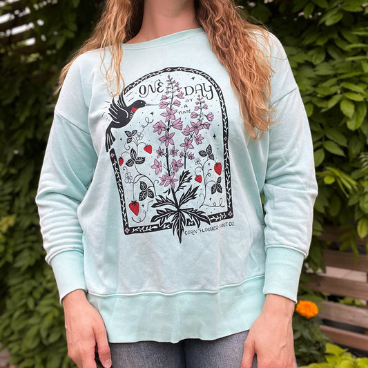 One Day at a Time | July Birth Flower | Light Blue Sweatshirt | XL