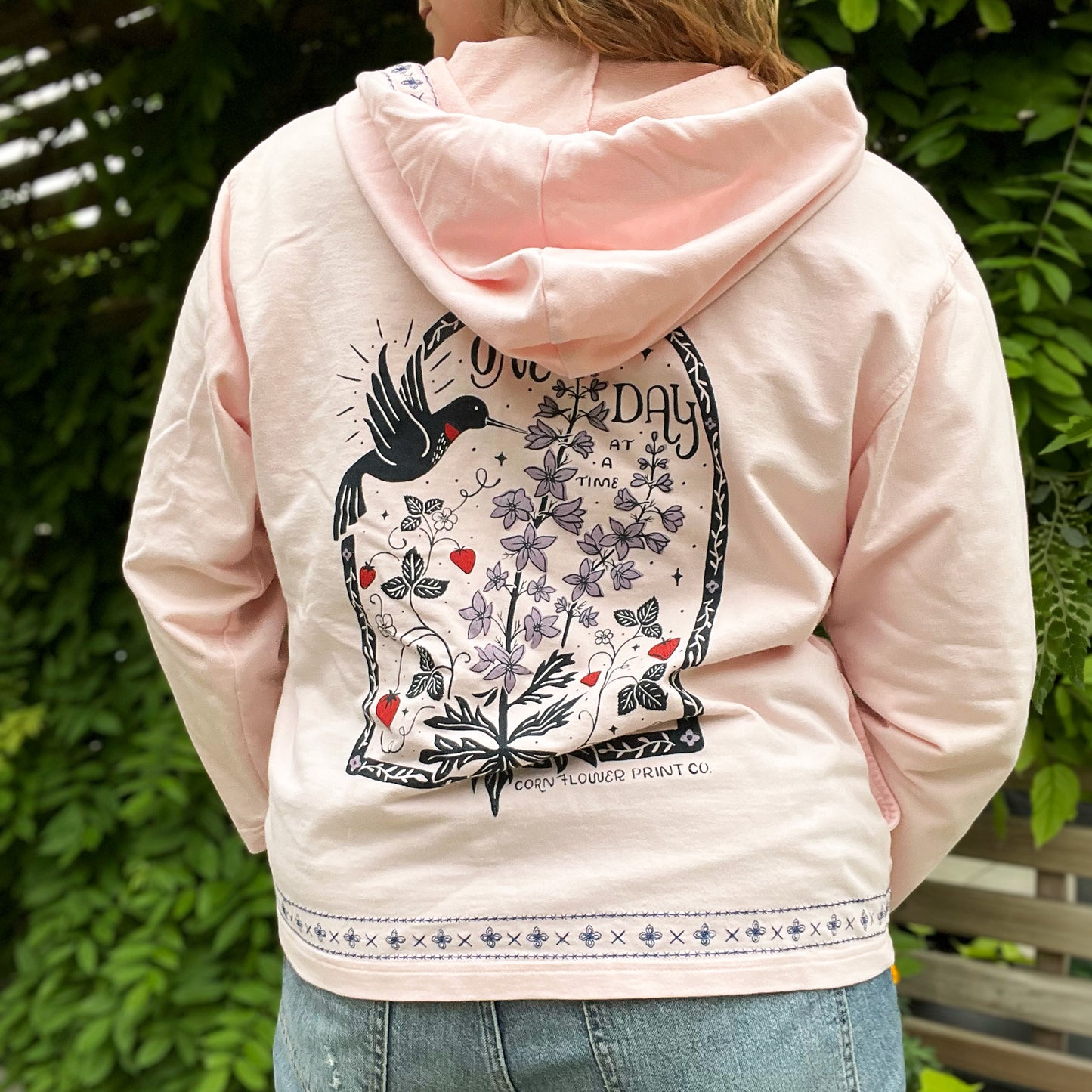 One Day at a Time | July Birth Flower | Pink Zip Up Hoodie Jacket w Embroidery Detail | Large